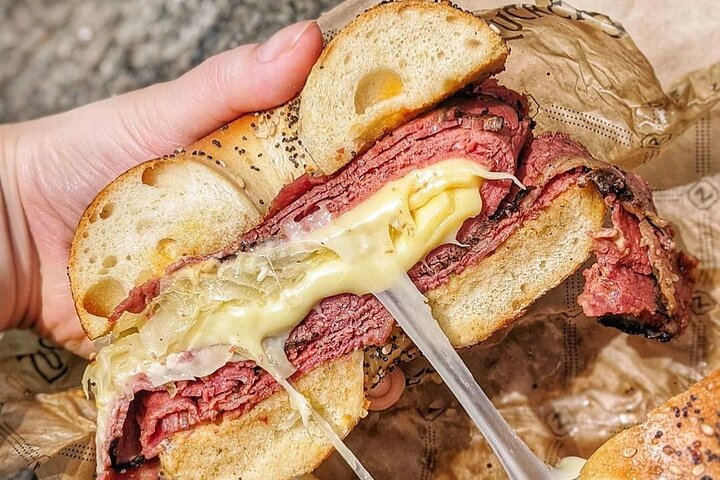 Savor a perfect Reuben sandwich showcasing NYC's culinary scene. Each bite offers a taste of local culture and commitment to sustainable ingredients in the heart of the city.